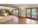 Open concept kitchen and living room area, featuring a wooden deck visible through sliding glass doors at 4606 Sundance Trl, Indianapolis, IN 46239