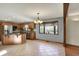 Spacious kitchen with stainless steel appliances, granite countertops, and a view of the backyard at 4606 Sundance Trl, Indianapolis, IN 46239
