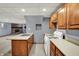 View of the basement kitchenette with sink, countertop and cabinets; leads to living area at 4606 Sundance Trl, Indianapolis, IN 46239
