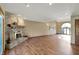Spacious living room featuring a stone fireplace, hardwood floors, and an open layout at 4606 Sundance Trl, Indianapolis, IN 46239