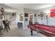 Finished basement with a bar, pool table, and lounge area, perfect for entertaining at 5875 Annanhill Ct, Avon, IN 46123