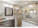 Modern bathroom with glass-enclosed shower and stylish vanity at 5875 Annanhill Ct, Avon, IN 46123