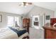 Spacious bedroom with vaulted ceiling and stylish ensuite bathroom at 5875 Annanhill Ct, Avon, IN 46123