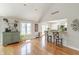 Living room with an open layout, vaulted ceilings, and seamless connection to the adjacent kitchen area at 5875 Annanhill Ct, Avon, IN 46123