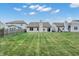 A beautifully maintained lawn in the backyard, perfect for outdoor activities and relaxation at 6103 Pebblebrooke Rd, Whitestown, IN 46075