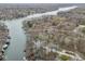 Aerial view of a waterfront community surrounded by lush greenery at 6141 Flamingo Dr, Nineveh, IN 46164