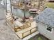 Aerial view of a lakeside property with multiple decks, firepit, and waterfront access at 6141 Flamingo Dr, Nineveh, IN 46164