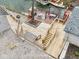 Expansive backyard deck with multiple levels, hot tub, fire pit, dock, and outdoor dining area with pergola at 6141 Flamingo Dr, Nineveh, IN 46164