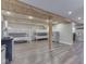 Spacious basement with bunk beds and wood-look flooring and white walls and ceiling at 6141 Flamingo Dr, Nineveh, IN 46164