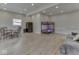 Finished basement with bunk beds, table with chairs, small refrigerator and sofa at 6141 Flamingo Dr, Nineveh, IN 46164