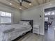 Bedroom featuring a gray bed frame, natural light, and wood-paneled ceiling at 6141 Flamingo Dr, Nineveh, IN 46164