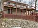 Multi-tiered decks offer ample outdoor living with space for dining and lounging at 6141 Flamingo Dr, Nineveh, IN 46164