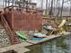 Multi-level decks lead to a private boat dock and waterfront recreational area at 6141 Flamingo Dr, Nineveh, IN 46164