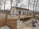 Exterior view shows a home with a large wooden deck and access to outdoor recreation at 6141 Flamingo Dr, Nineveh, IN 46164