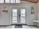 Interior view of double patio doors that lead to a deck overlooking the lake at 6141 Flamingo Dr, Nineveh, IN 46164