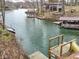 Beautiful waterfront property with docks, boat lifts, and a fun slide into the lake at 6141 Flamingo Dr, Nineveh, IN 46164