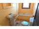 Bathroom needing full renovation with standard sink, toilet, and bathtub at 621 N Euclid Ave, Indianapolis, IN 46201