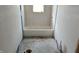 Bathroom with standard tub and tile, prepped for renovation and upgrades at 621 N Euclid Ave, Indianapolis, IN 46201