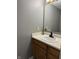 Bathroom with light wood vanity and countertop with stylish accessories at 6318 Amarillo Way, Indianapolis, IN 46237