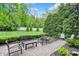 Backyard patio with comfortable seating and lush greenery at 6430 Meridian Pkwy # Apt A, Indianapolis, IN 46220
