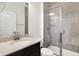 Bright bathroom featuring a sink with marble countertop and a glass enclosed shower at 6430 Meridian Pkwy # Apt A, Indianapolis, IN 46220