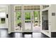 Bright view to outdoor patio, accessible via windows and door from a well-lit living space at 6430 Meridian Pkwy # Apt A, Indianapolis, IN 46220
