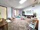 Versatile bonus room with ample space for play, featuring a door leading to the outside at 6723 Balmoral Rd, Indianapolis, IN 46241