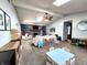 Spacious living room with vaulted ceilings, fireplace, playroom area and plenty of natural light at 6723 Balmoral Rd, Indianapolis, IN 46241