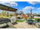 Spacious back deck with outdoor dining set, grill, and patio furniture, great for entertaining at 6826 Hague Rd, Indianapolis, IN 46256