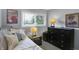 Charming bedroom with ample natural light, a comfortable bed, and tasteful furnishings for a peaceful atmosphere at 6826 Hague Rd, Indianapolis, IN 46256