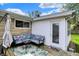 Inviting outdoor deck featuring comfortable seating, a stylish rug, and convenient access to the home at 6826 Hague Rd, Indianapolis, IN 46256