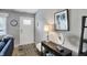 Inviting entryway featuring neutral tones, decorative accents, and a stylish area rug at 6826 Hague Rd, Indianapolis, IN 46256