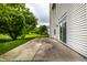 View of the back patio leading to a large grass yard and pergola at 7131 Topp Creek Ct, Indianapolis, IN 46214