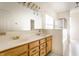 Bright bathroom features a double vanity, soaking tub, and a separate shower for convenience at 7131 Topp Creek Ct, Indianapolis, IN 46214