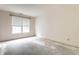 Bright bedroom featuring a large window and a spacious layout ready for personalization at 7131 Topp Creek Ct, Indianapolis, IN 46214