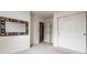 Bright bedroom with a large mirror and double sliding-door closet for ample storage at 7131 Topp Creek Ct, Indianapolis, IN 46214