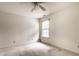 Large bedroom featuring a ceiling fan and natural light offers a serene retreat at 7131 Topp Creek Ct, Indianapolis, IN 46214
