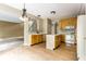 Open concept kitchen with island and bar, providing ample counter space and modern appliances at 7131 Topp Creek Ct, Indianapolis, IN 46214