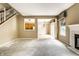 Open-concept living room with fireplace, connecting to the kitchen and dining area at 7131 Topp Creek Ct, Indianapolis, IN 46214