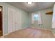 This cozy bedroom features carpet, closet, and a window for natural light at 7180 W Sacramento Dr, Greenfield, IN 46140