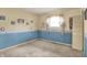 Bedroom with nautical-themed decor, a closet, and a sunlit window with curtains at 7702 Dornock Dr, Indianapolis, IN 46237