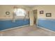 Bedroom with nautical-themed wallpaper and decor, natural light from the window at 7702 Dornock Dr, Indianapolis, IN 46237