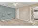 Neutral bedroom with standard closet at 7702 Dornock Dr, Indianapolis, IN 46237