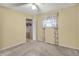 Bedroom with a window, closet, and natural light, creating a bright and inviting space at 7702 Dornock Dr, Indianapolis, IN 46237
