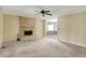 Spacious living room with a fireplace and neutral tones at 7702 Dornock Dr, Indianapolis, IN 46237