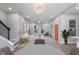 Bright, open living room with modern lighting, neutral tones and stylish furnishings at 838 N Tacoma Ave, Indianapolis, IN 46201