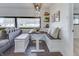 Inviting dining area with built-in bench seating and a view into the adjacent living room at 91 Crestview Dr, Greenwood, IN 46143