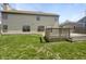 Wide shot of backyard with a newly updated wooden deck and lush green grass at 9162 Hadway Dr, Indianapolis, IN 46256