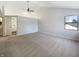 Bright bedroom with a ceiling fan and natural light with an ensuite bathroom entrance at 9162 Hadway Dr, Indianapolis, IN 46256