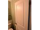 Clean bathroom featuring a white door, toilet, and neutral wall color for a simple design at 10360 Wilson Rd, Brownsburg, IN 46112